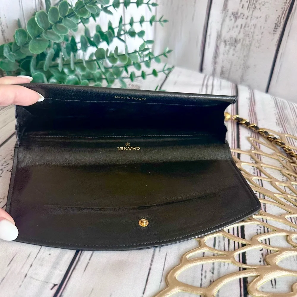 CHANEL Black and Gold Clutch with Iconic Design - Picture 9 of 10